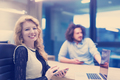 Elegant Woman Using Mobile Phone in startup office building - PhotoDune Item for Sale