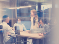Startup Business Team At A Meeting at modern night office buildi - PhotoDune Item for Sale