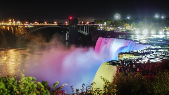 Niagara Falls at Night. The Jets of Falling Water Are Illuminated with Colored Spotlights