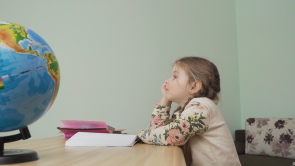 Adorable Little Girl Is Bored and Doesn't Want to Make Homework