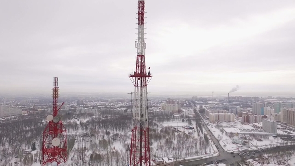 Drone Is Moving To a Site of Telecom Tower When Workers Are Performing Repair alt