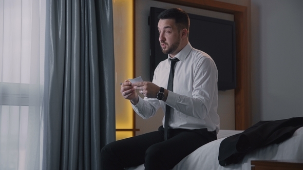 Bearded Businessman Preparing Speech on Bed