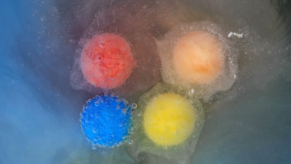 Round Candy Similar To a Tablet, Dissolves in Water, Releasing Bubbles,