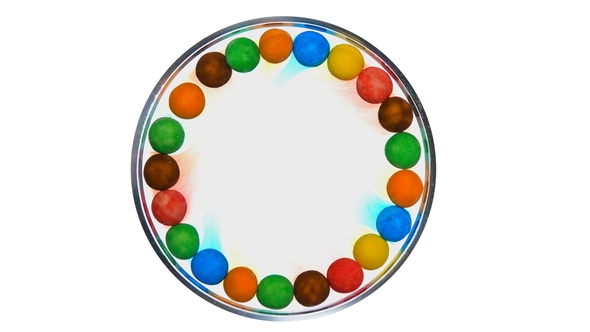 Colorful Candies Gathered Around,are Dissolved in a Round Saucer,the Sun Forming a Rainbow