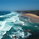 Aerial Footage of Ocean Waves Reaching Shore at West Coast Portugal - VideoHive Item for Sale