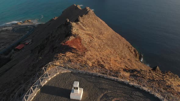 Aerial tilt up from Flores viewpoint reveal Atlantic Islet, Porto Santo Island