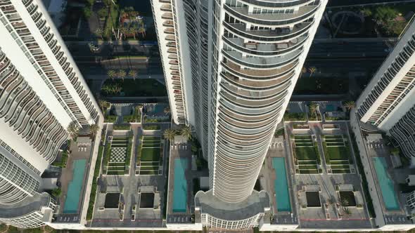 Cinematic Aerial View on Blue Pools at Luxury Residential Buildings.  Aerial