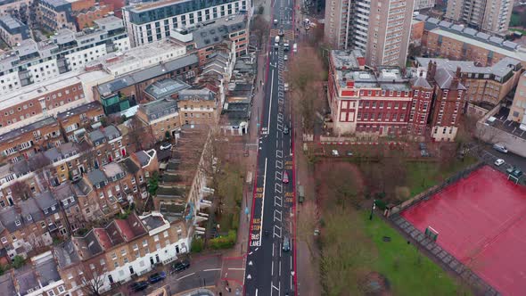 Beautiful Pan up reveal Drone shot from City road Angel to Atlas tower and skyscrapers London