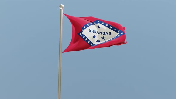 Arkansas flag on flagpole.