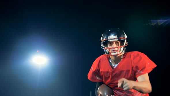 Sportsman Catches a Ball and Points To a Camera, Close Up.