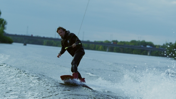 Man Wakeboard Boat on River. Extreme Water Sports