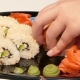 Carefully Lay Sushi Rolls on a Plate - VideoHive Item for Sale