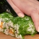 The Cook Cuts a Green Sushi Roll - VideoHive Item for Sale