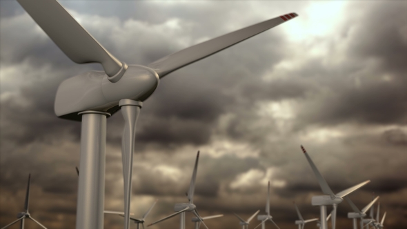 Wind Generators Farm Against a Storm Sky