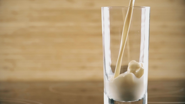 Pouring Soy Milk or Soymilk Into Glass