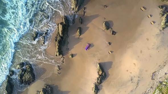 Unreal Picture Woman Lies on Azure Ocean Beach Aerial View