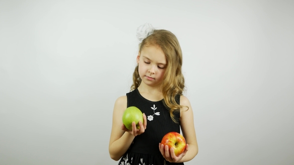 The Girl Wonders Which Apple To Choose