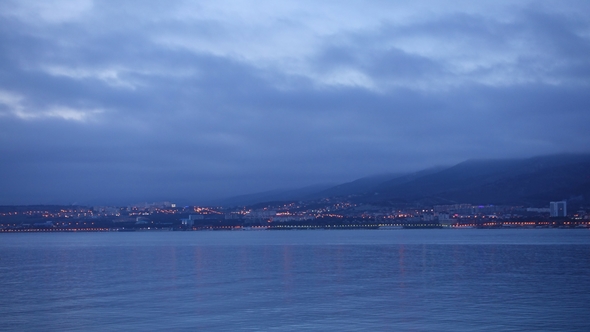  Beautiful Evening Sky Over Night City and Sea