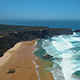 Drone Footage of Rocky Coast with View of Cliffs in Algarve Region, Portugal - VideoHive Item for Sale