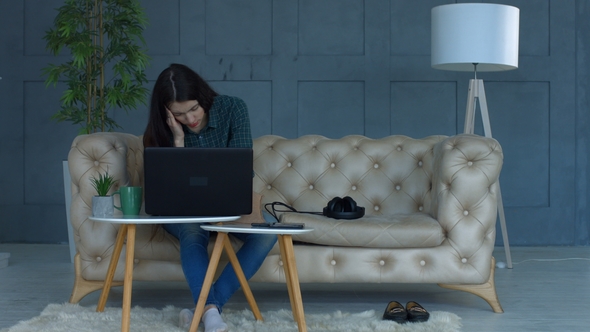 Attractive Woman Taking Medicine To Releave Headache