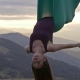 Woman in Hammock Meditating Upside Down at Sunset - VideoHive Item for Sale