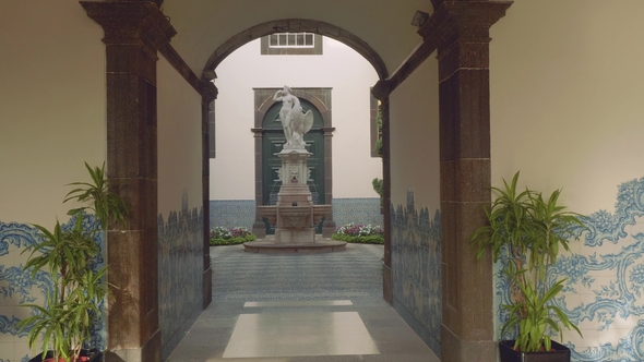 View of Court with Monument through Tunnel