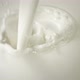 Close-up pouring milk in Slow Motion with crown splash - VideoHive Item for Sale