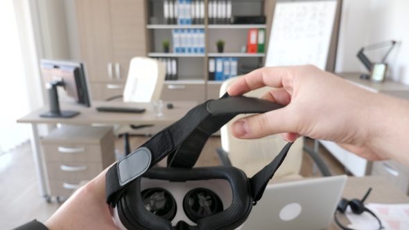Putting Virtual Reality Headset on