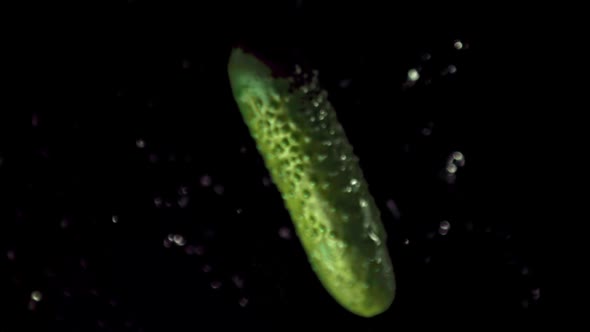 Super Slow Motion is One Cucumber with Drops of Water