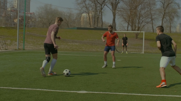 Young Soccer Players in Action on Sports Field