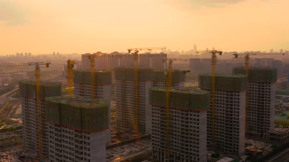 Aerial of construction site at sunset