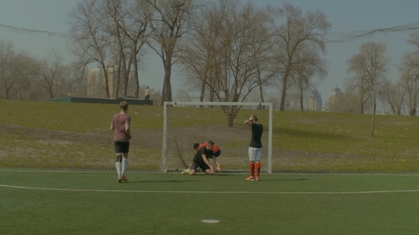 Striker Celebrating a Goal During Football Match