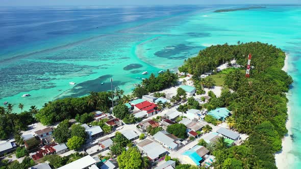 Natural birds eye tourism shot of a paradise sunny white sand beach and blue water background in bes