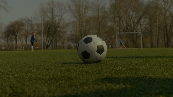 Footballer Kicking Soccer Ball During Free Kick