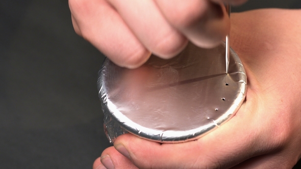 Stitching a Foil Needle on the Bowl