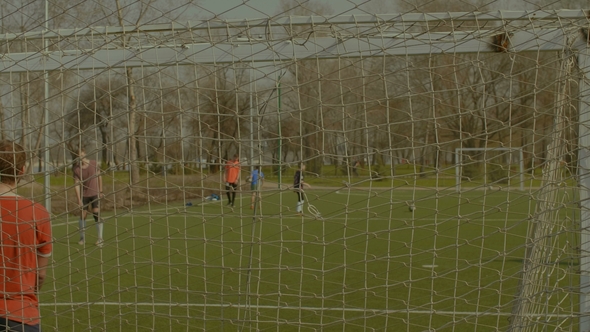 Soccer Ball Blazing Out the Crossbar After Kick