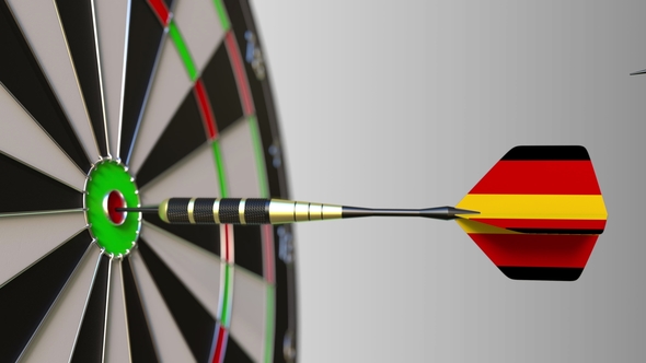 Flags of Australia and Germany on Darts Hitting Bullseye of the Target alt