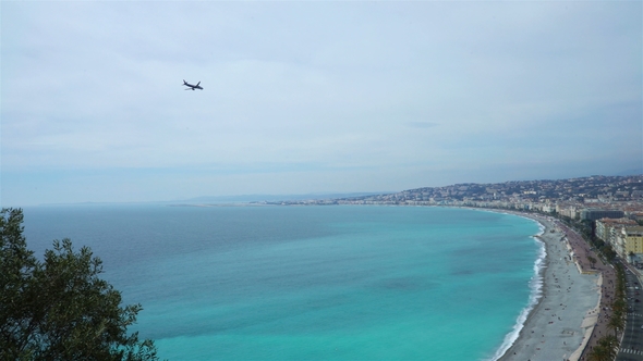 Plane Flying over the Bay of Angels in Nice at Provence, Cote D'azur, France