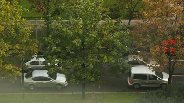 Traffic Jam Cars Driving Slowly Down Street Air Pollution by Exhaust Gases