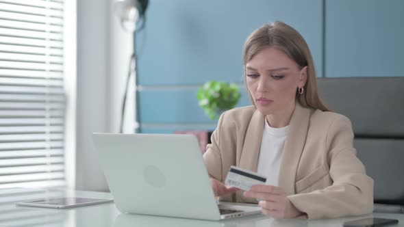 Businesswoman Having Online Payment Failure in Office