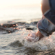 A Little Girl Splashing Sea Water by the Seacoast - VideoHive Item for Sale