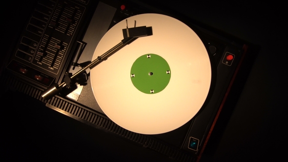 Vinyl Record Pleer. Plays Song From an Old Turntable  Top View.