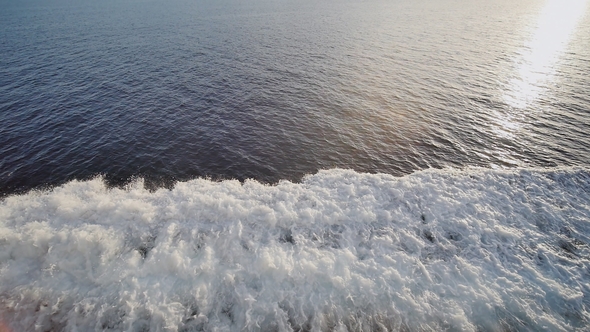 Background of Water Trail Foaming Behind a Ferry Boat