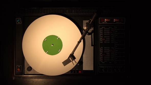 Vinyl Record Pleer. Plays Song From an Old Turntable  Top View.