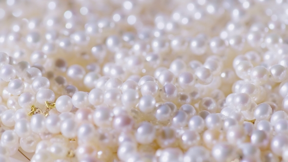 Beads Made From Natural White Pearls Slowly Rotate