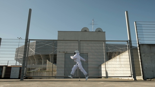 Running Astronaut. Cosmonaut Jumping Along the Space Station