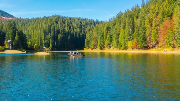 Autumn Mountain Lake with Colorful Trees in the Forest