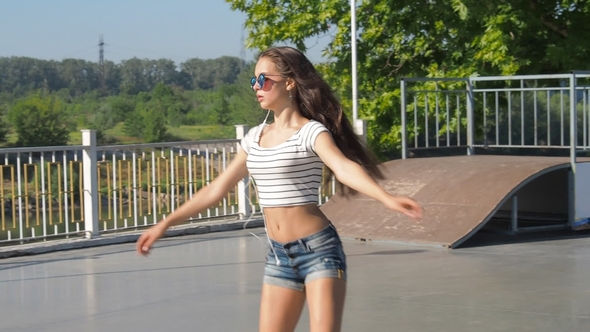 Beautiful Teen Girl Roller-Skating