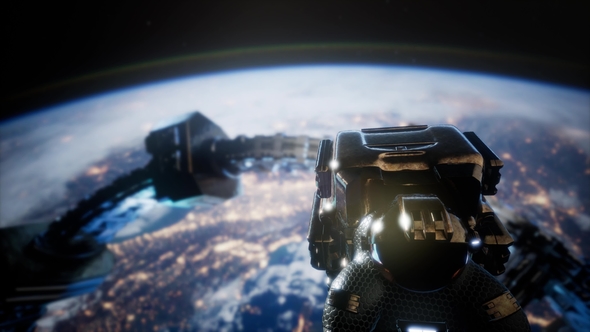 Astronaut and International Space Station alt