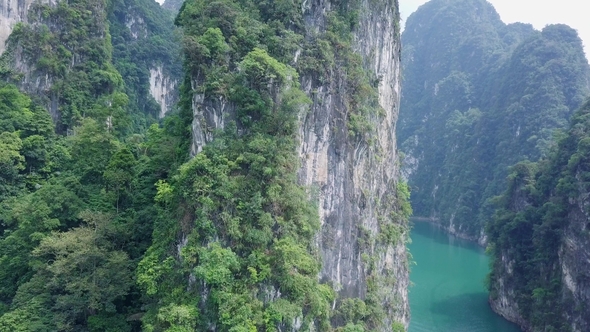  Limestone Rocks Rising From Water. 